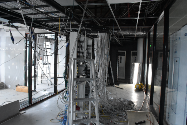 Server rack installation with blue ethernet cabling